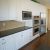 Gowanus Cabinet Painting by NYCA Contractors, LLC